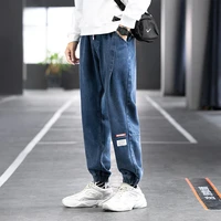 2021 spring and autumn new youth loose jeans mens korean version of the trendy trousers fashion casual wide leg trousers men