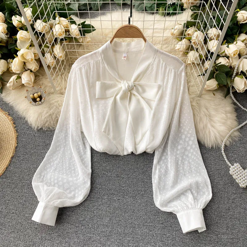 

2021 Women's Spring New Blouse Korean V-neck Bow Puff Sleeve Loose Wave Point Chiffon Shirt D0140