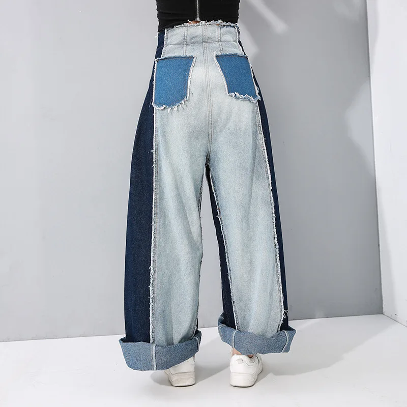 Джинсовые брюки с широкими штанинами объемные ковбойские контрастные Сращенные