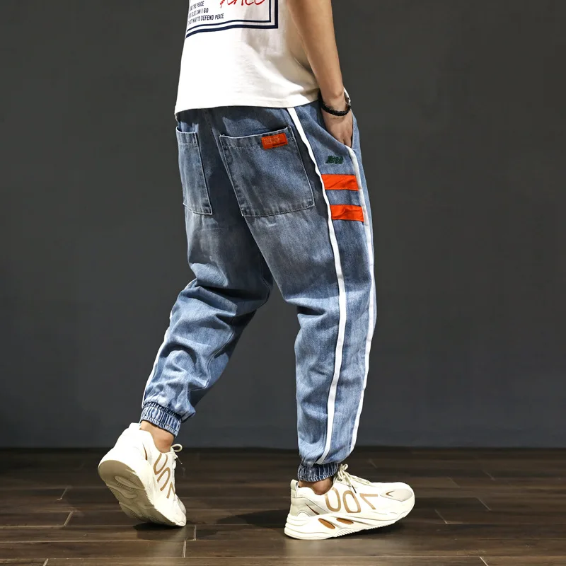 

Jeans Fashion Streetwear Men Blue Color Loose Fit Side Stripe Spliced Harem Jeans Men Cargo Pants Slack Bottom Hip Hop Joggers