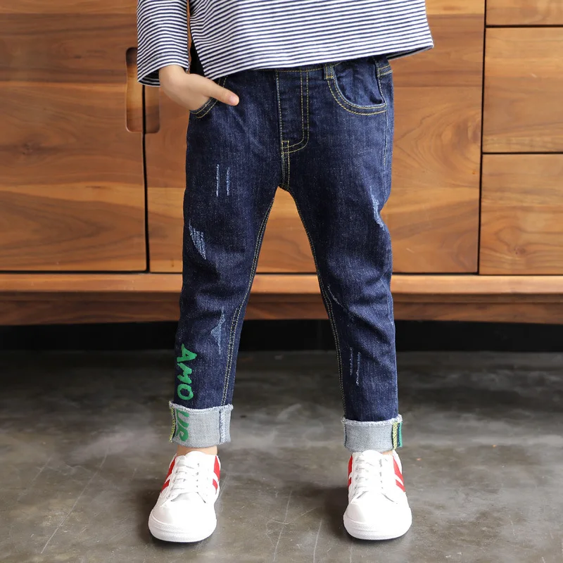 

2021 spring and autumn new style boys' fashion personalized scratch jeans boys' solid color letter printing casual pants