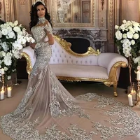 dubai arabic luxury sparkly wedding dresses sexy bling beaded lace applique high neck illusion long sleeves mermaid chapel