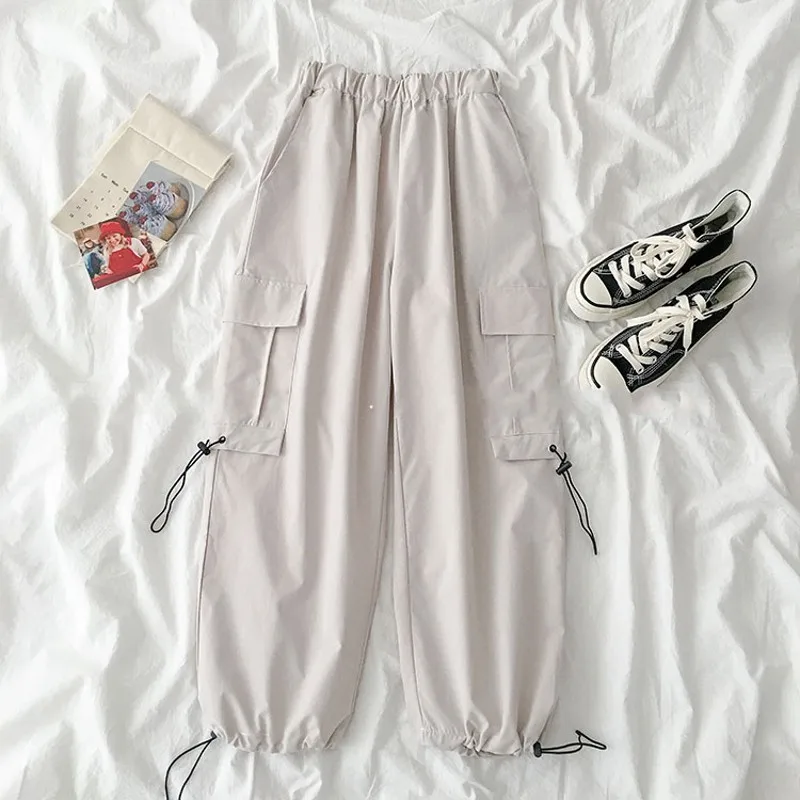 

Штаны женские карго с вышивкой и высокой талией