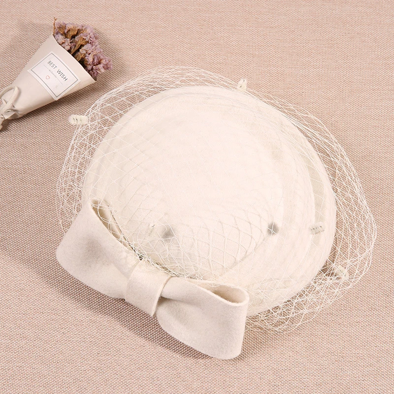 

2019 Fascinating Fedoras Elegant Female Wool Felt Mesh Bow Floral Pillbox Hat With Veils Ladies Fascinator Wedding Hats LM011