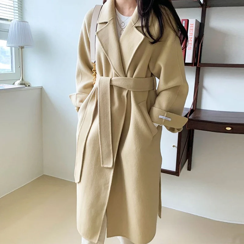 

Корейский шикарный осенне-зимний женский костюм во французском стиле с воротником на шнуровке приталенное шерстяное пальто с длинным рука...