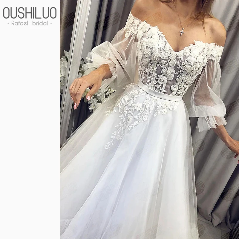 Прозрачное свадебное платье с длинным рукавом открытыми плечами корсет