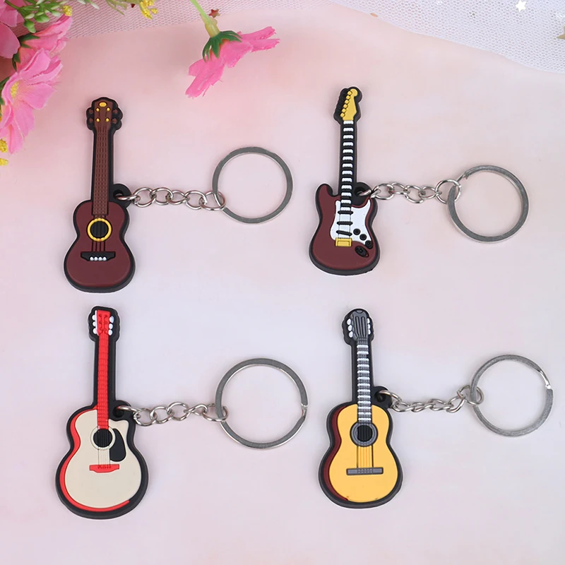 

HWetR New 2Pcs Soft Silicone Instrument Keychain Folk Electric Classical Guitar Ukulele Key Ring High Quality Wholesale