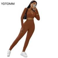 2022 new casual tight fitting sports suit women autumn and winter long sleeved v neck two piece set women solid color