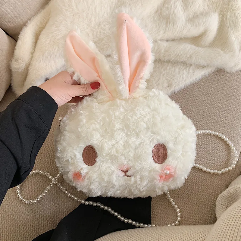 

Japanese cute soft girl rabbit fur bag female 2020 Korean cartoon Plush shoulder messenger bag mobile phone bag