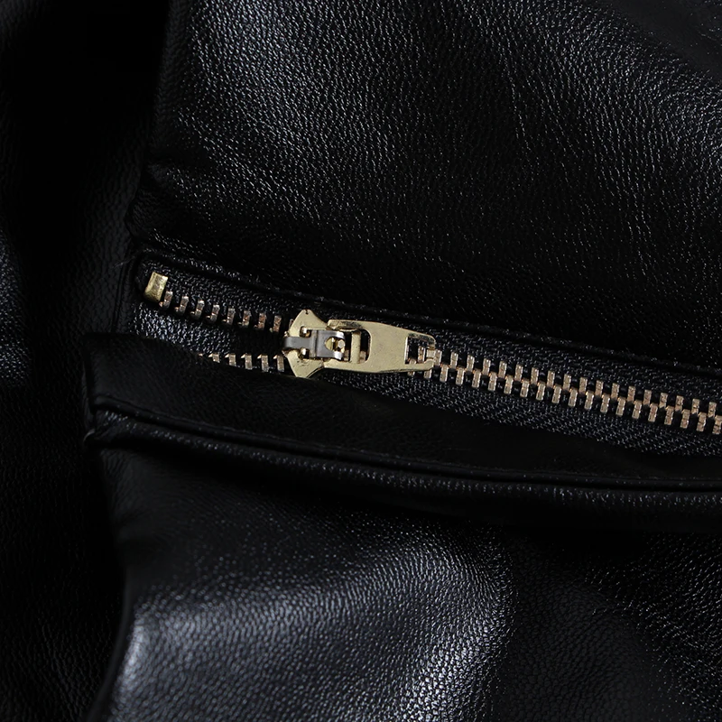 

TWOTWINSTYLE Hollow Out PU Leather Jumpsuit For Women Lapel Long Sleeve Lace Up Casual Vintage Jumpsuits Female Autumn Fashion