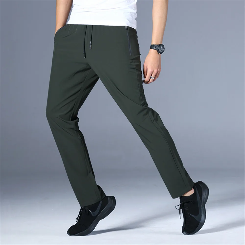 

Men Women Jogger Pants Fitness Stretch Quick-Drying Trousers Summer Fishing Sun Protection Breathable High Quality Fashion Pant