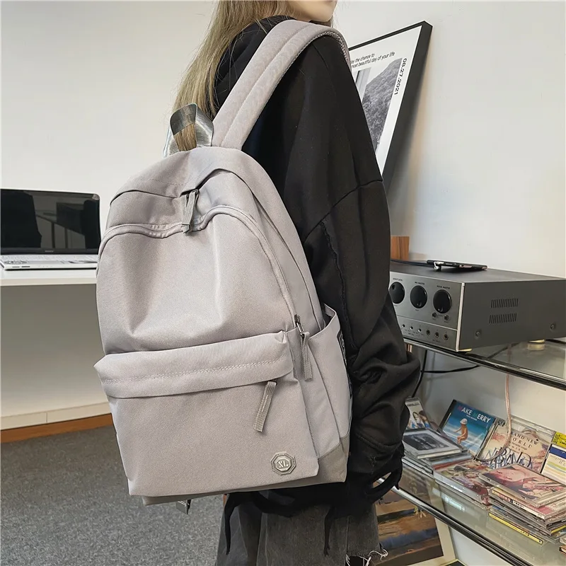 

Solid Color Casual 2021 New Unisex Fashion Backpack Women Book Bag Student Nylon School Bags College Travel For Teenage Girls