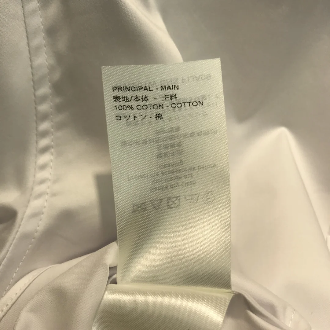 

2021 White Women Shirts Luxury Brand Lapel Long Sleeve All-match Cotton Shirts Summer Office Lady Chic Metal Ribbon Loose Shirt