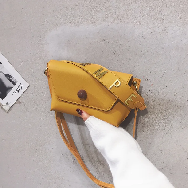 

Saddle bag solid color letter PU leather bag round handbag female retro half month package 2019 new ins fashion wholesale