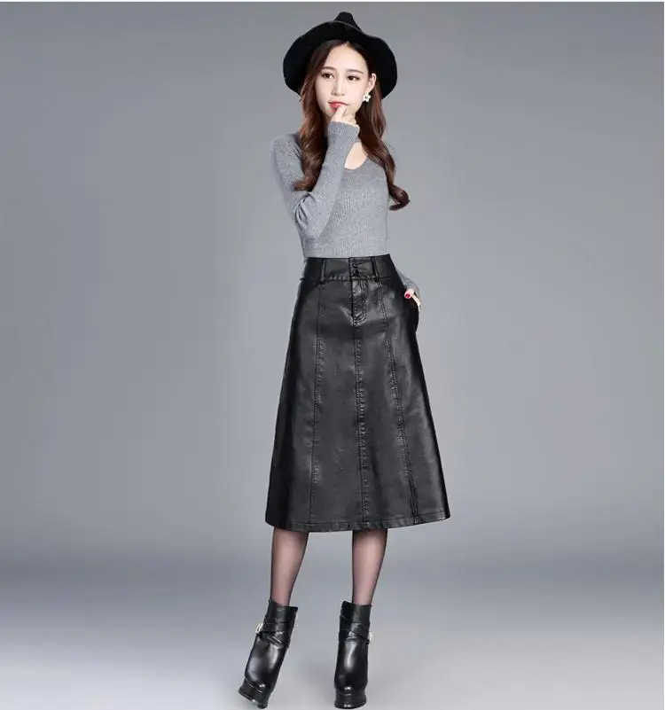 Женская кожаная юбка с завышенной талией трапециевидная черная средней длины из