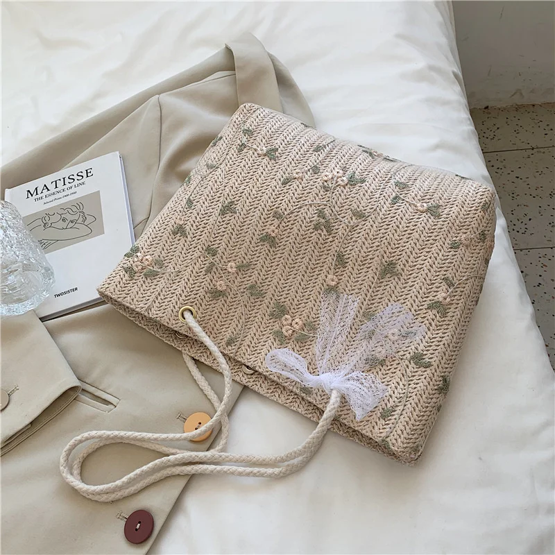 

Simple Straw Woven Foreign Style One Shoulder Tote Bow Knot Small Fresh Handbag 2021 New Popular Women's Bag