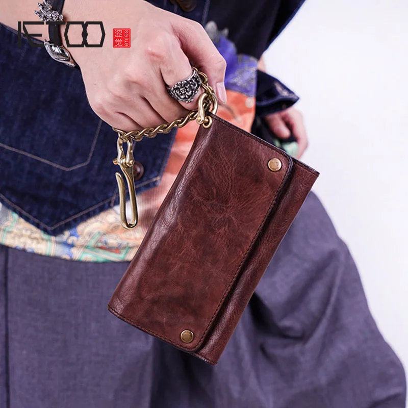 AETOO Top layer cowhide simple retro wallet, multi-card leather zipper long wallet, brass treasury cloth buckle wallet