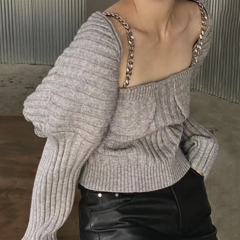 

Korea chic niche metal chain knitted camisole + outer puff sleeve sweater shawl two-piece female