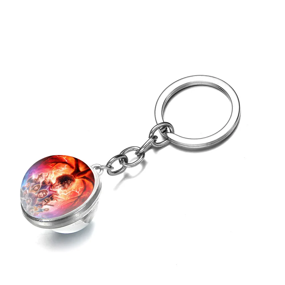 Брелок для ключей мужской двусторонний с кабошоном со стеклянным шариком в стиле
