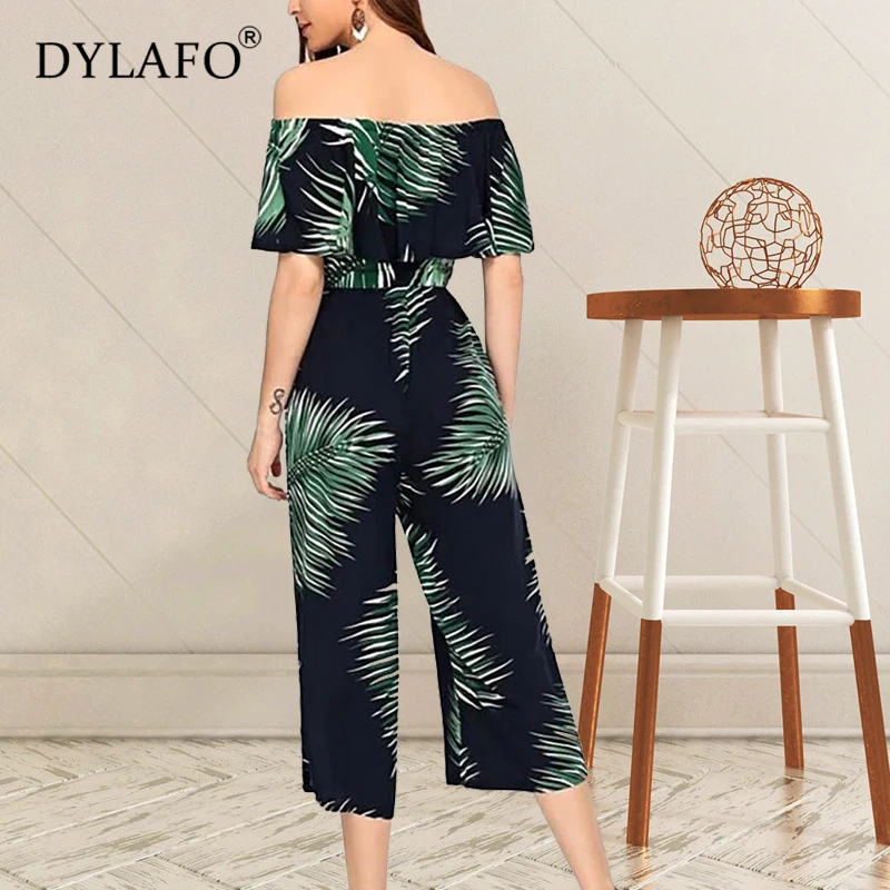 Женский комбинезон с воланом зеленый открытыми плечами элегантные вечерние