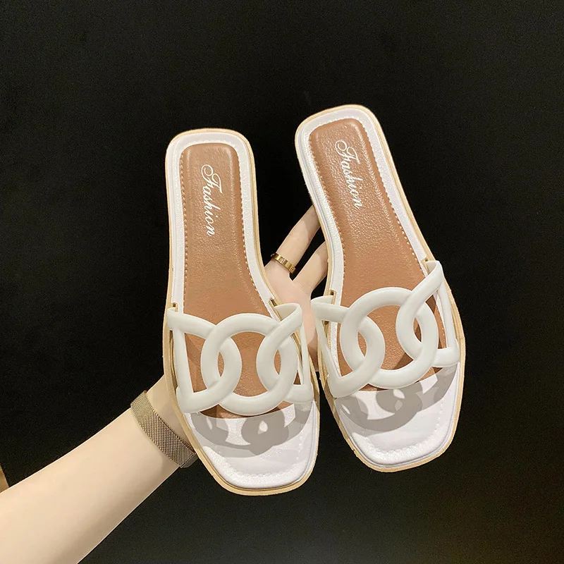 

New hollow pig nose sandals women's summer outdoor beach comfortable flat bottom flip flops anti slip slippers wholesale
