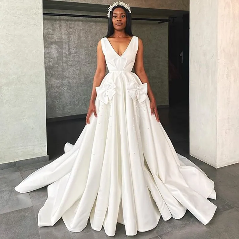 

African Ivory Wedding Dress Deep V-Neck Pearls Bows Draped Long Bridal Gowns Satin Long Dubai Arabic Women vestidos de novia