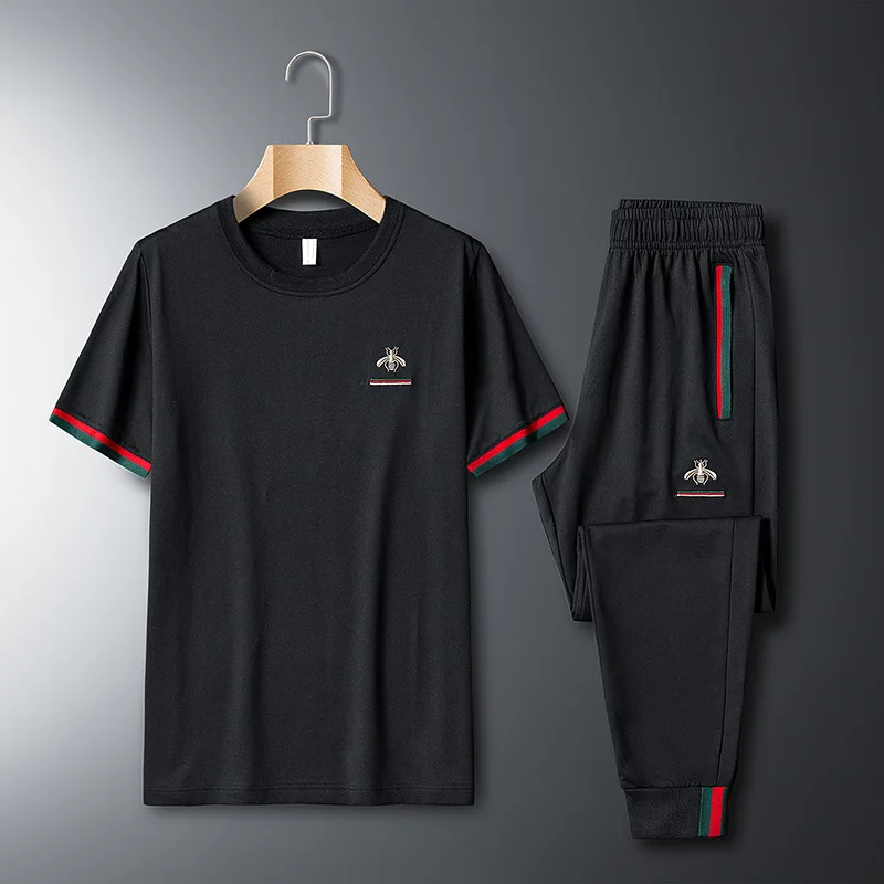 

2021 summer men's casual short-sleeved solid color round neck sports suit jacket + shorts 2-piece set
