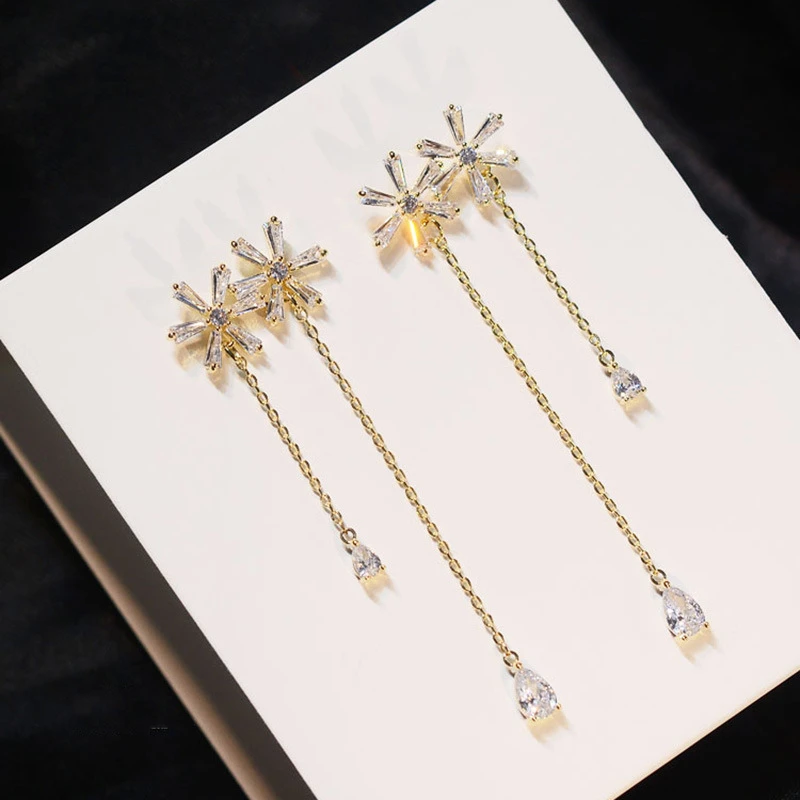 

2020 new tassel 925 silver needle butterfly flower earrings Korean temperament long tassel earrings show face thin earrings fema