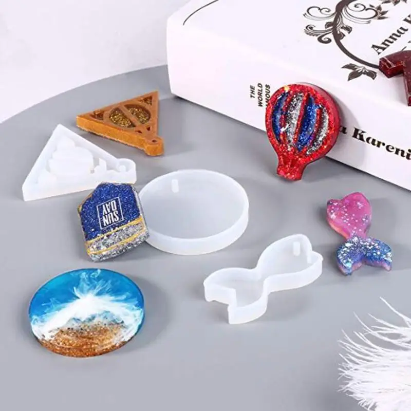 

8Pcs Keychain Pendant Resin Molds Skull T-shirt Horn Babysuit Epoxy Resin Mold Silicone Molds Jewelry Making Tools