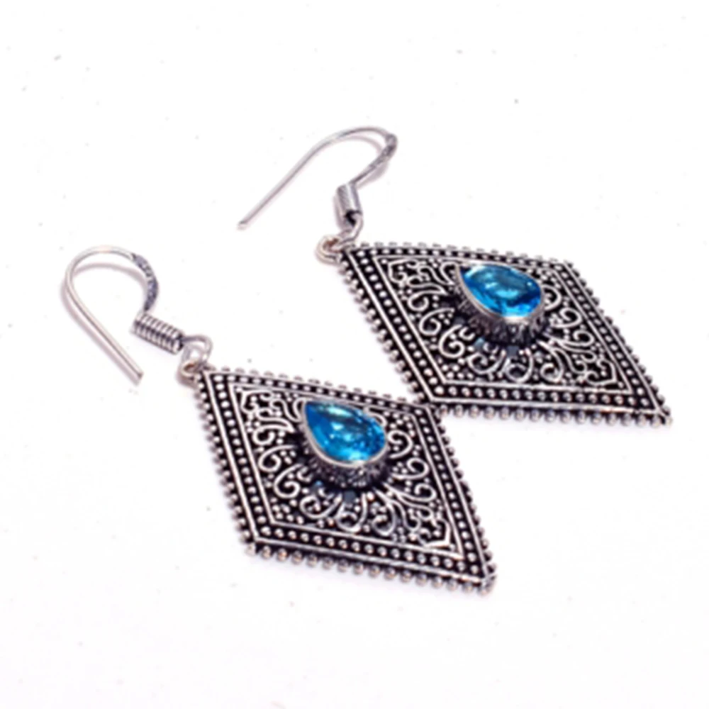 

Blue Topaz Silver Overlay on Copper Earrings , Hand made Jewelry Gift