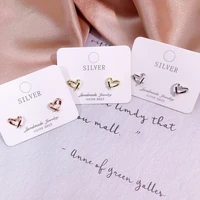 whole 100 925 sterling silver charm heart stud earrings fashion lasting shiny magical heart shape earring 18k exquisite jewelry