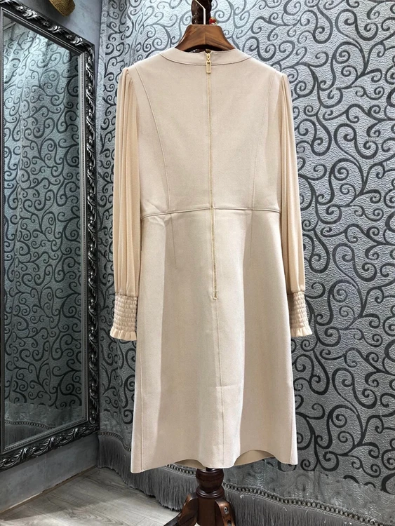 

2021 early spring new women's round neck zipper irregular stitching double breasted fake two-piece dress 105