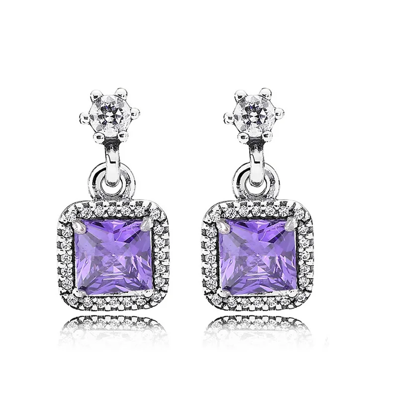 Женские серьги гвоздики серебряного цвета с кристаллами и