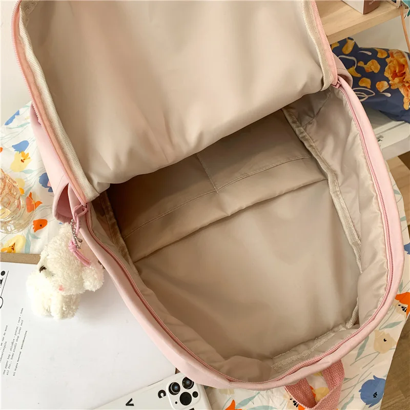 

EnoPella Fashion Girl Waterproof Women Backpack Female Nylon Black Travel Bag Multiple Pockets For Teenager Cute Kawaii Mochila