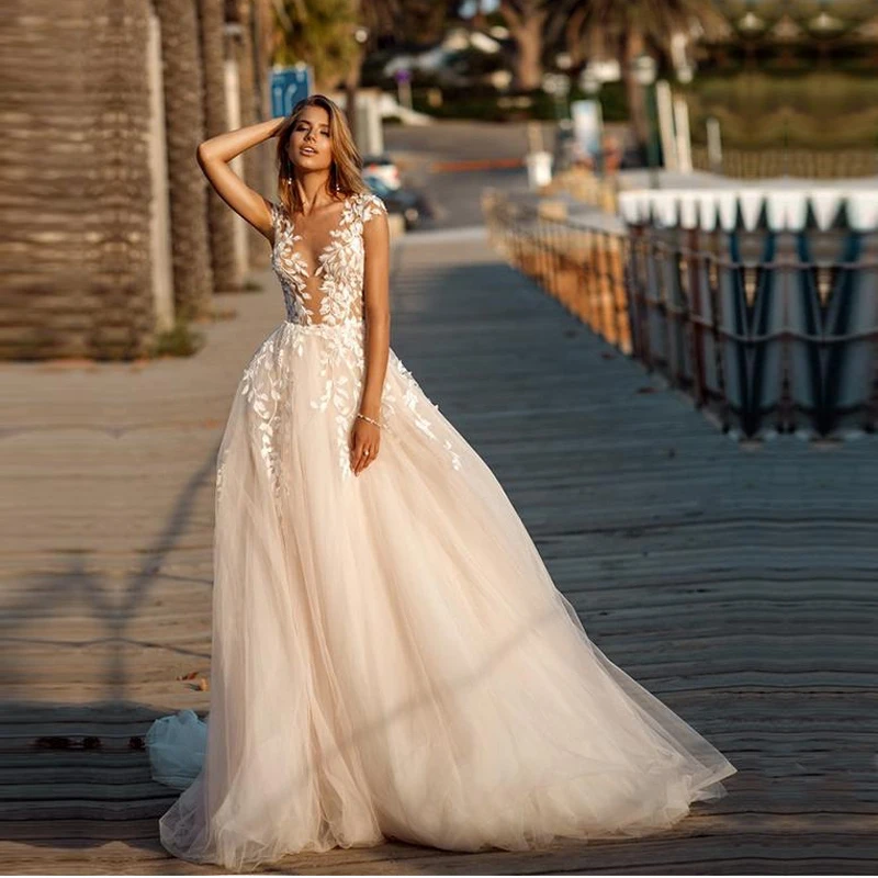 

Light Champagne V Neck Wedding Dress Sleeveless Appliques Tulle Ball Gown Bohemian Beach Boho Bridal Dresses