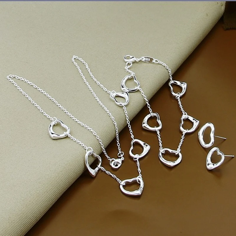 

Комплект из колье, браслета и сережек, из серебра 925 пробы