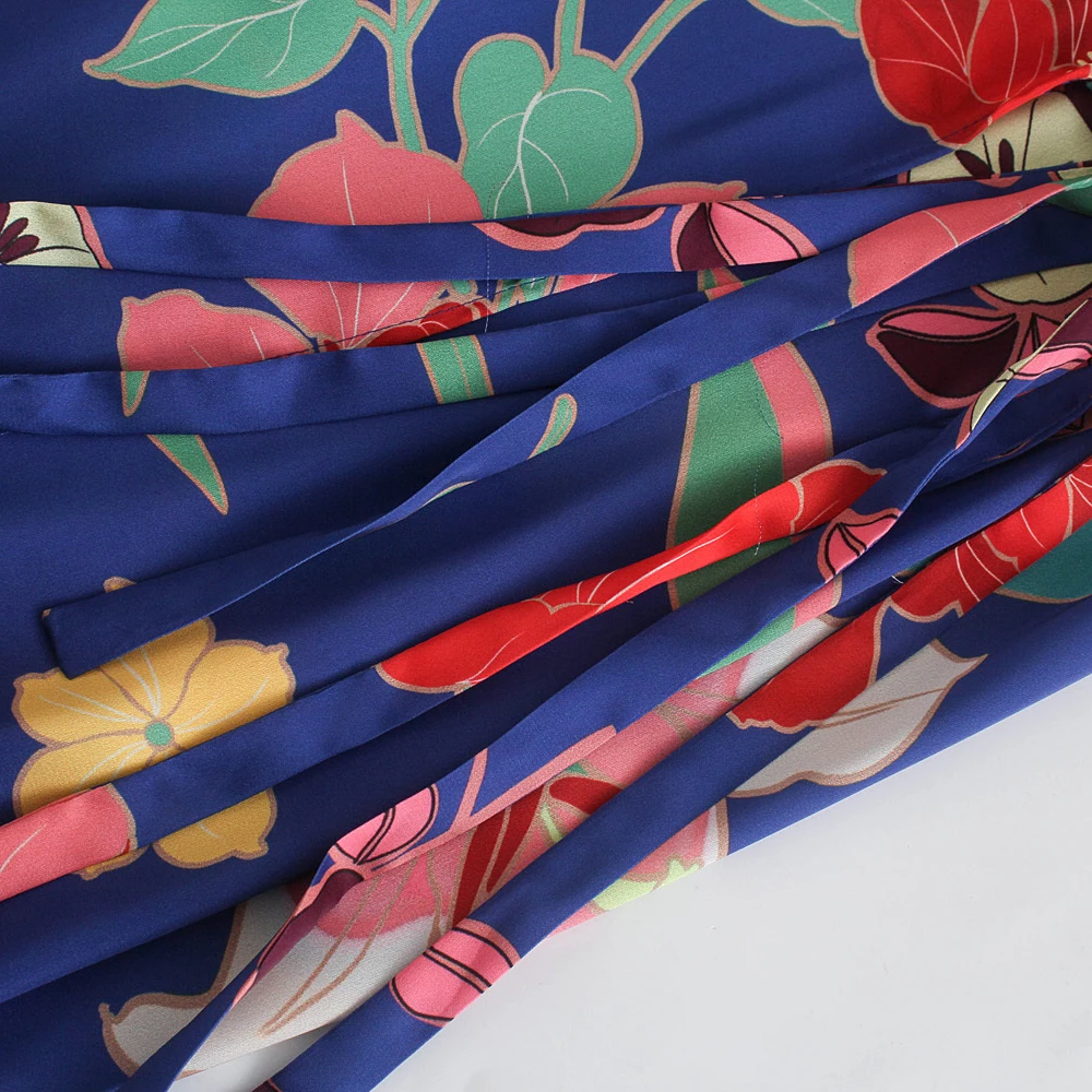 

Unizera 2021 European and American women's autumn new French retro V-neck flower print dress