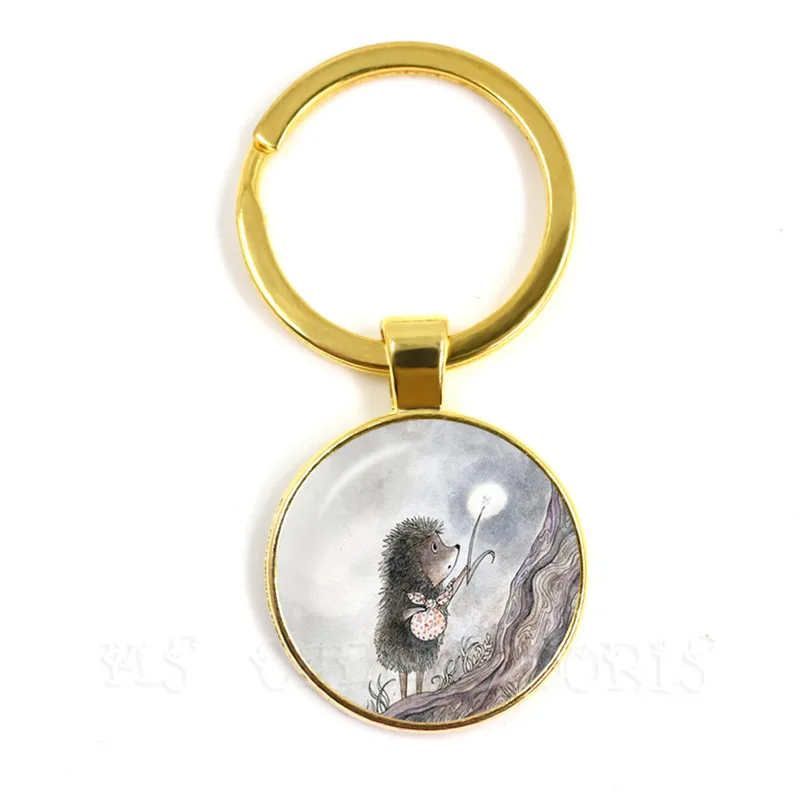 Винтажный брелок с ежиком в тумане позолоченный стеклянный кабошоном купол