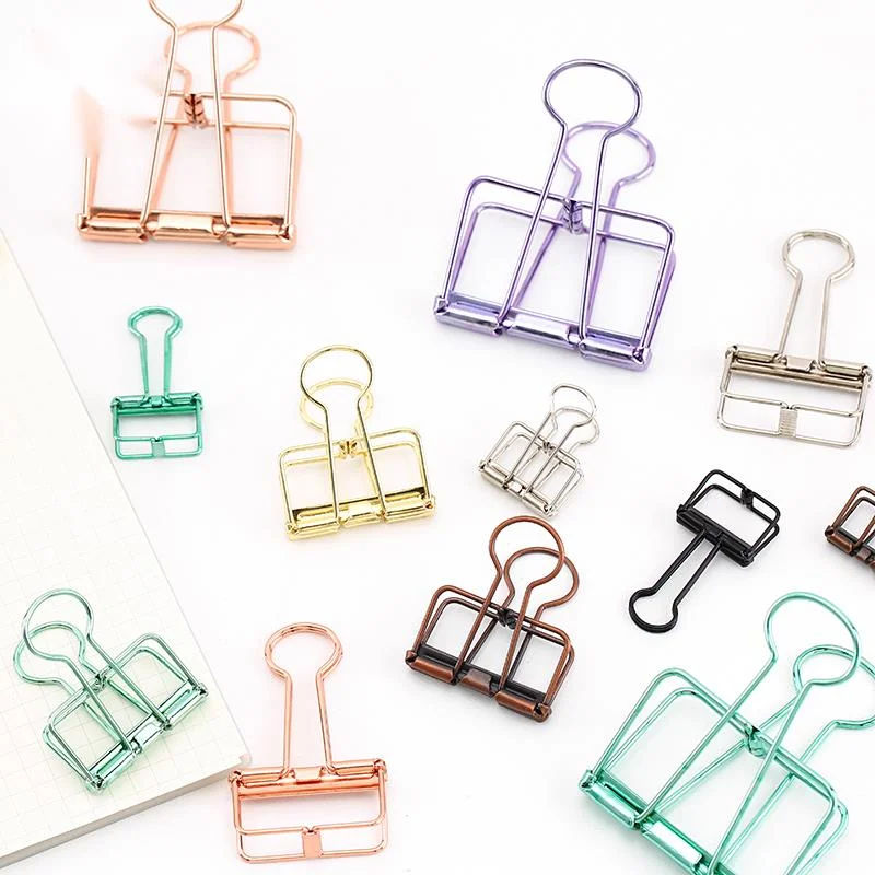 

Mr binding clip, small and medium-sized or large items, available in gold, silver, pink, green and purple, for office and