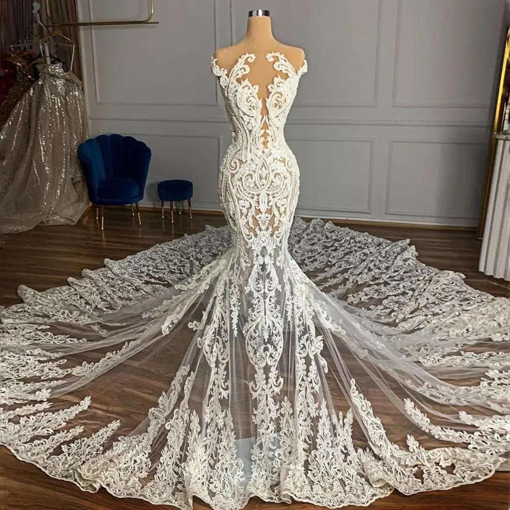 

2020 Luxurious Mermaid Wedding Dresses Lace Beaded Sheer Neck Bridal Dress Long Train Wedding Gowns with Nude Lining Custom Made