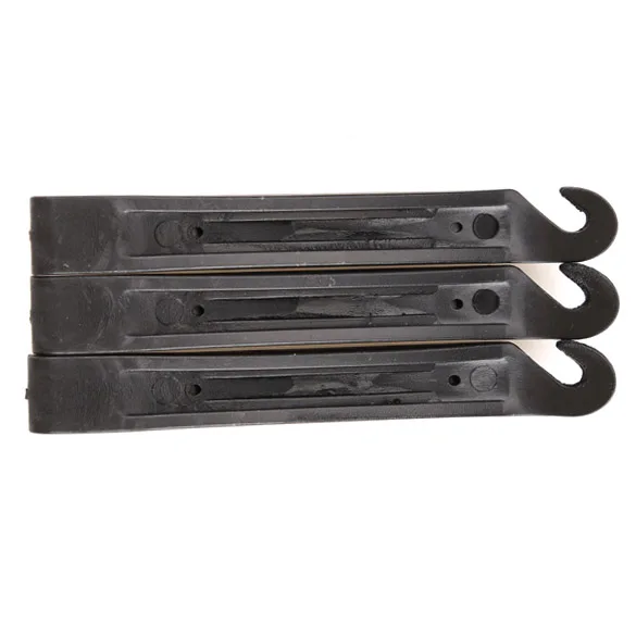 

Инструмент для замены шин в виде ложки