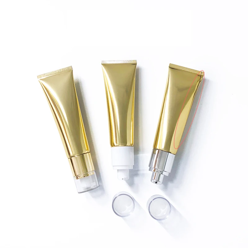 Пустая бутылка 50 мл из золотистого алюминия и пластика косметический Мягкий