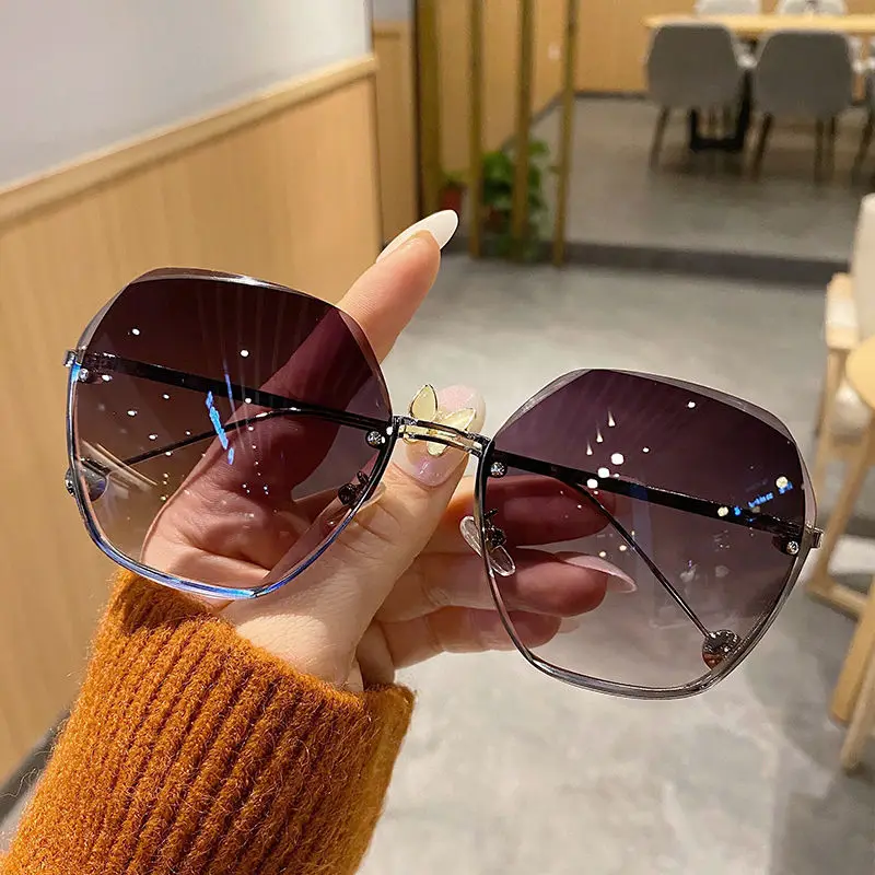 

New Style Rimless Cut Edge Sunglasses Fashionable Temperament Women Big Face Show Thin Fashion Glasses Anti Ultraviolet