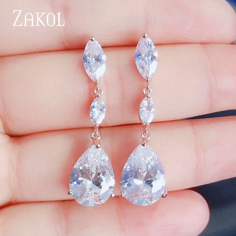 Элегантные длинные серьги-капли ZAKOL с фианитами для невесты ювелирные изделия