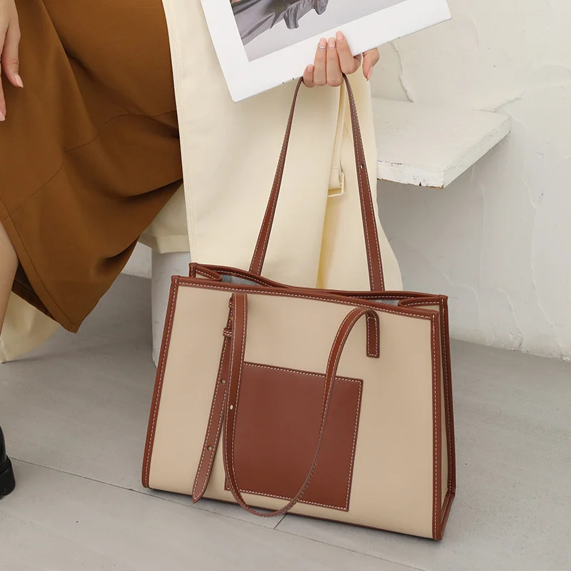 

Leather large bag Female Minority Middle Ancient bag 2021 new trend commuter Tote Bag single shoulder portable messenger women's