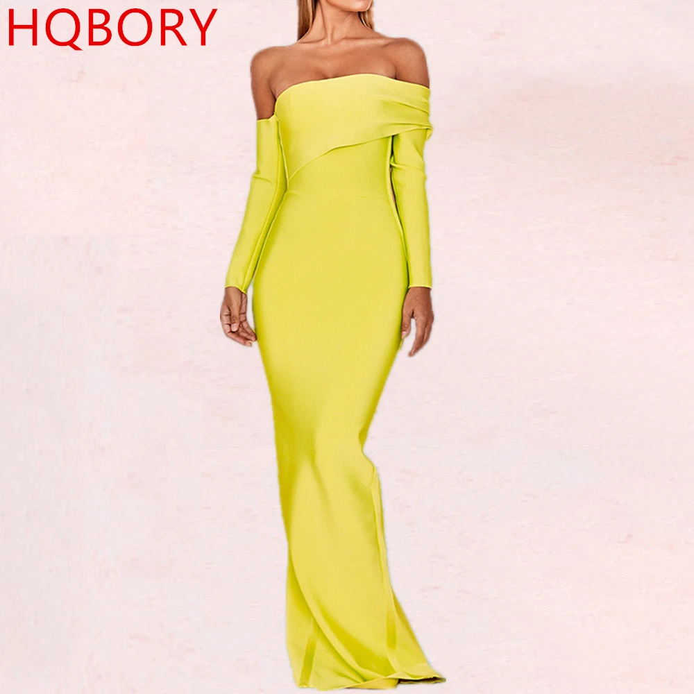 Женское длинное облегающее платье желтое до пола с открытыми плечами и