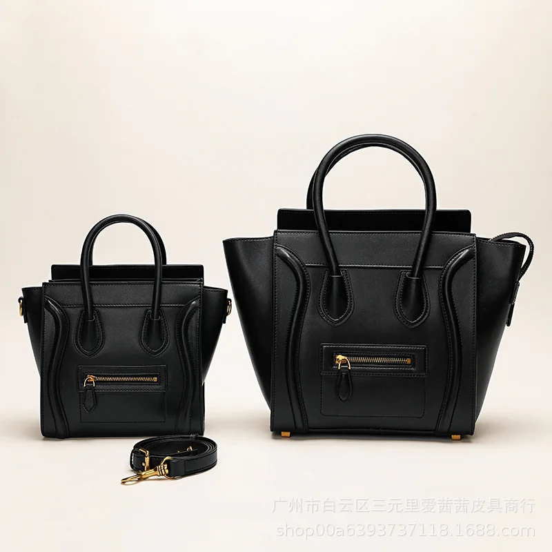 

Smile face bag women's leather handbag women's small bag messenger bag color contrast messenger 2021 new fashion face bag wing