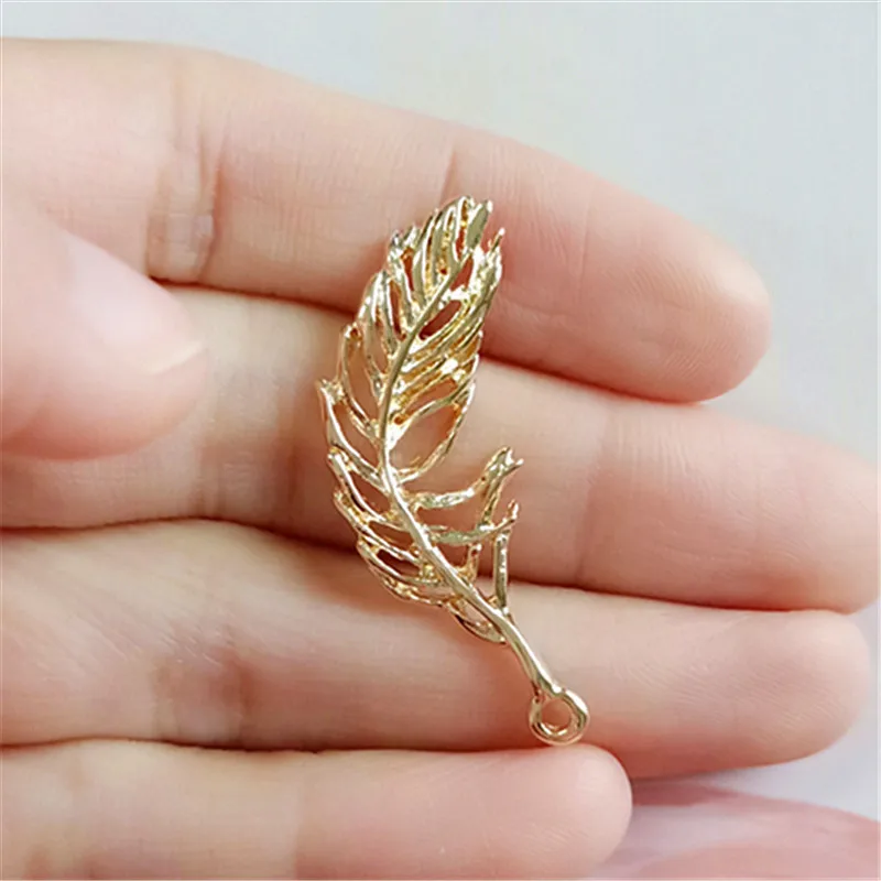 

50pcs 13*36mm Alloy Material Gold color Leaf Pendant Feather shape Charms for Necklace Pendants DIY Jewelry Findings Wholesale