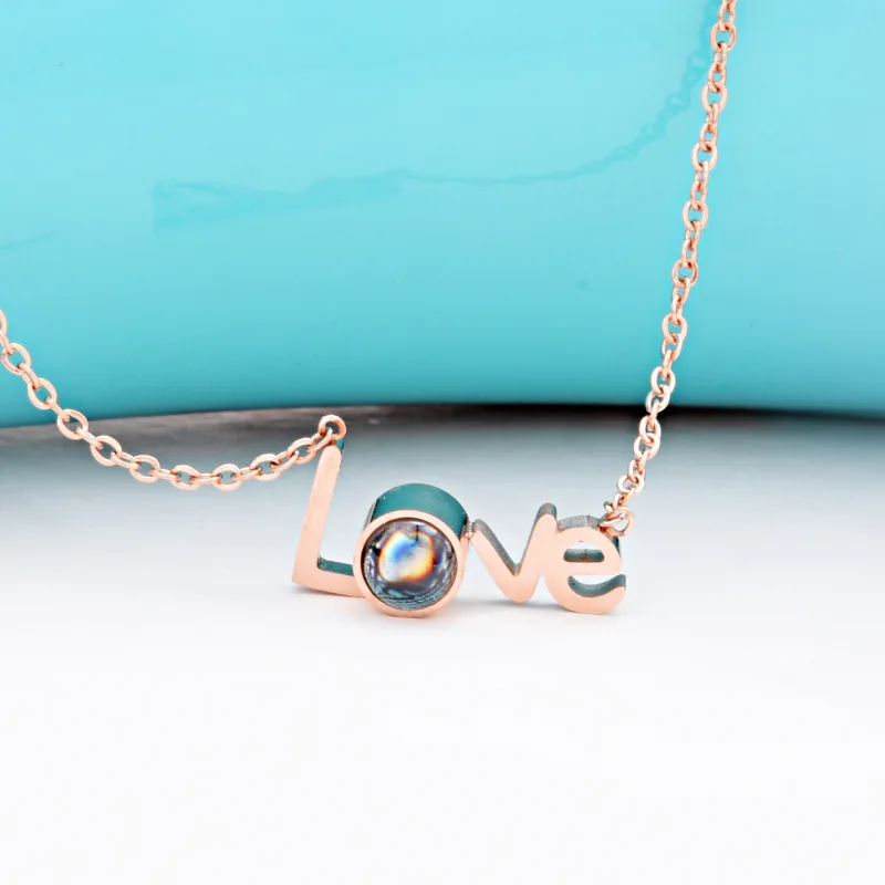 

Fashion new LOVE projection necklace female titanium steel 100 languages pendant clavicle chain jewelry hot sale