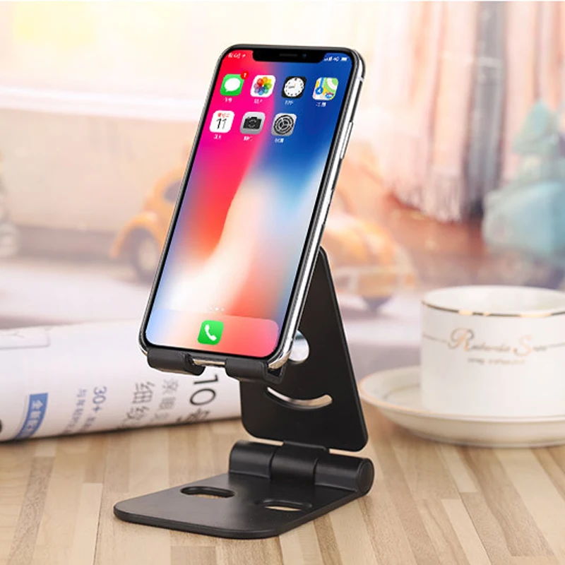 the new desktop tablet and phone holder plastic foldable universal bracket shaking sound live lazy charging bracket free global shipping